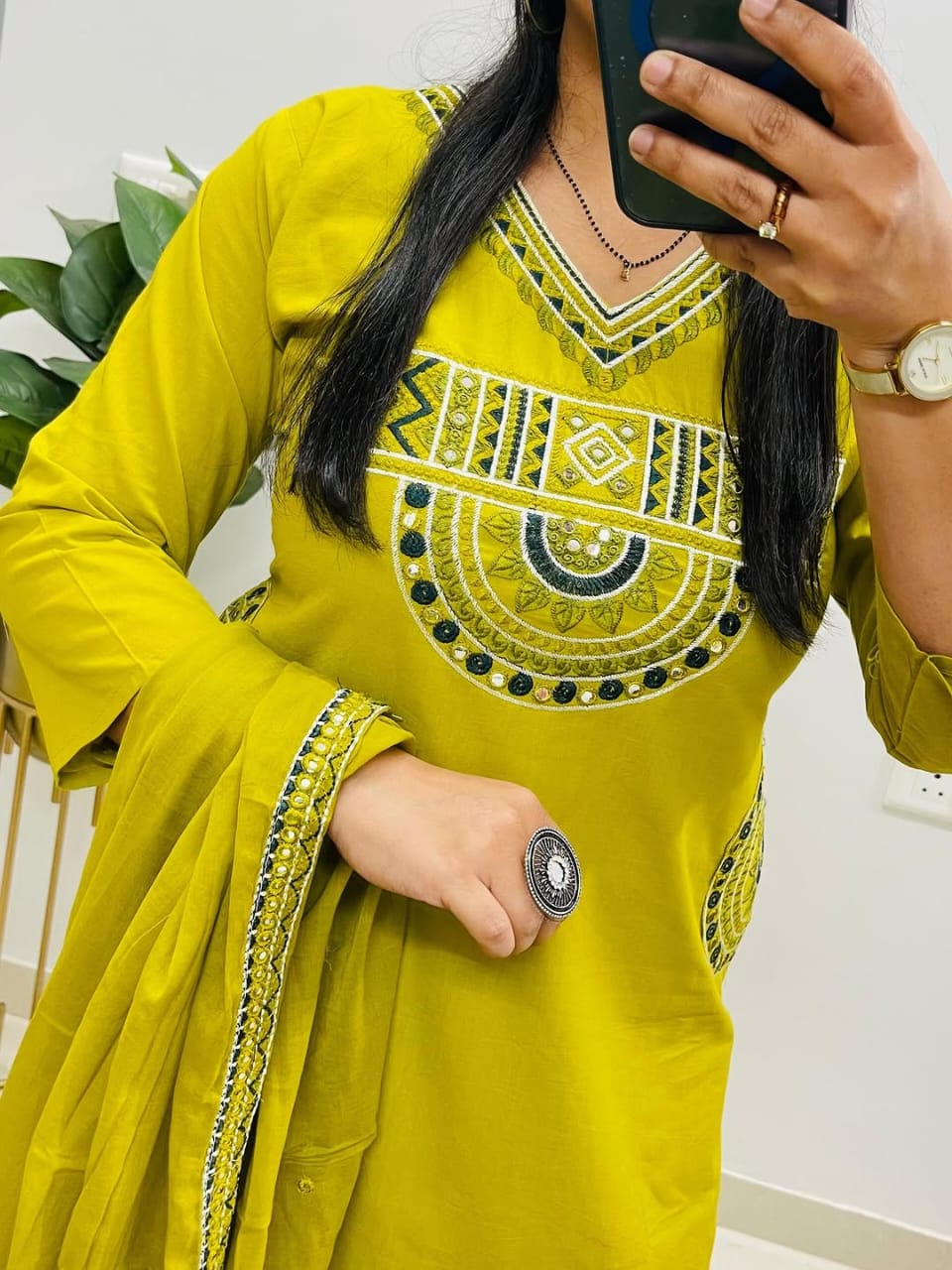 Yellow cotton kurta, pant, and dupatta set with embroidery work