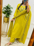 Yellow cotton kurta, pant, and dupatta set with embroidery work